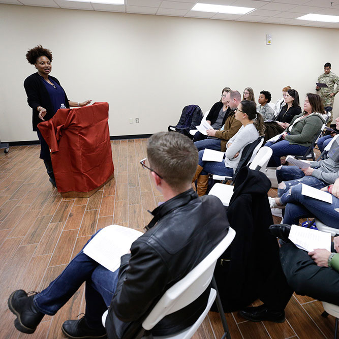 Tracy K. Smith conducts a reading and discussion with service members at Cannon Air Force Base near Clovis, New Mexico. January 11, 2018. Credit: Shawn Miller.