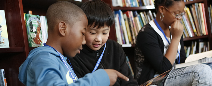 students reading books in library